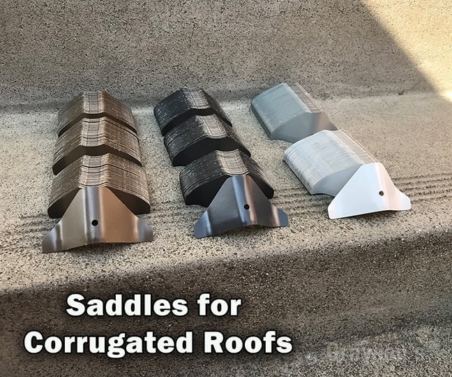 Metal saddles for gutter guard protection on corrugated roofs.