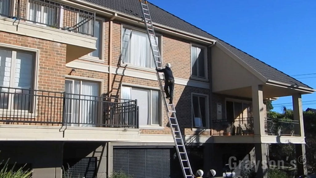 Accessing a triple storey roof with a long ladder