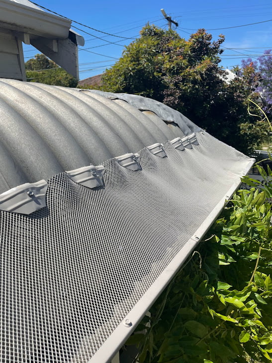 Gutter Guard Protection on steep bullnose roof
